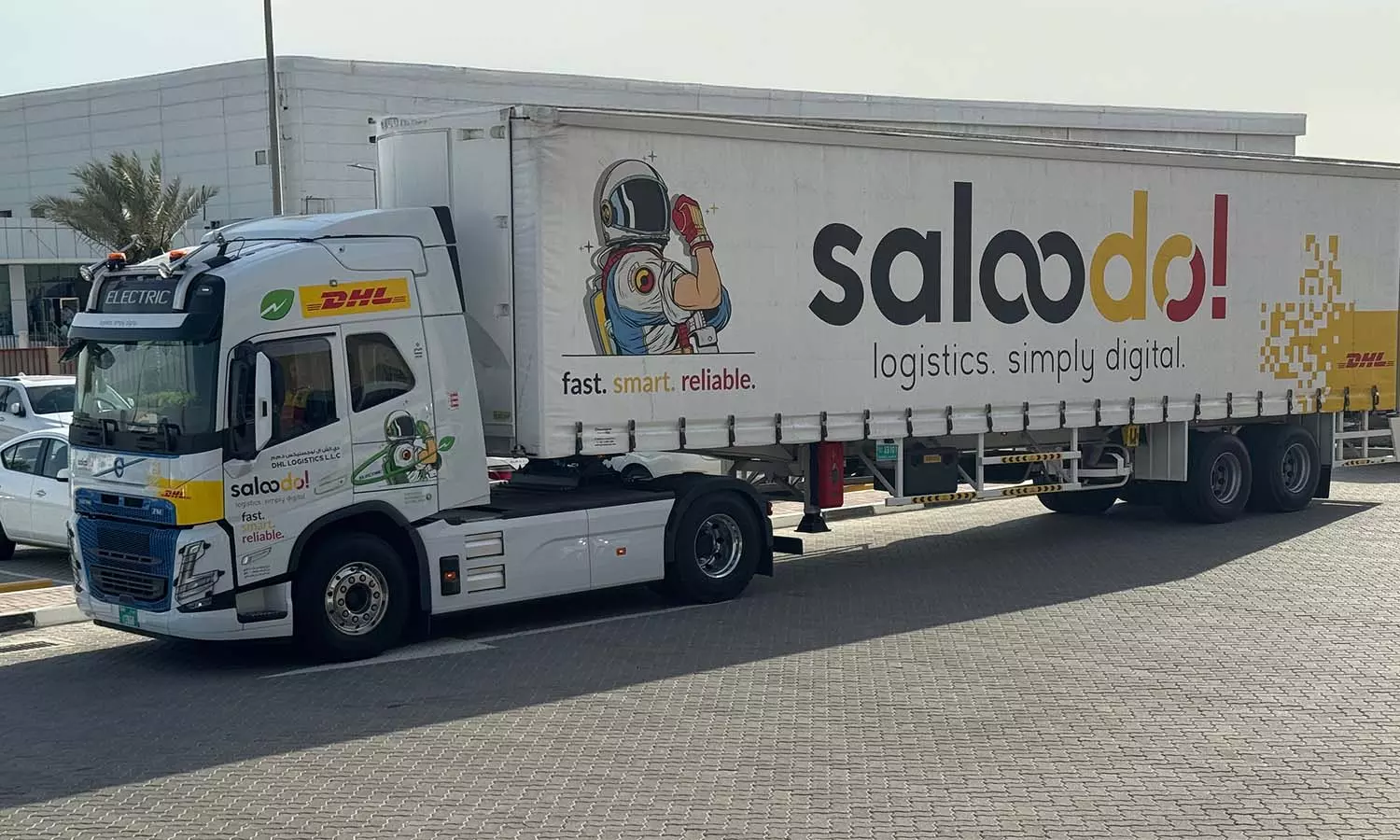 EV truck parked at DHL warehouse in Dubai South EV truck parked at DHL warehouse in Dubai South